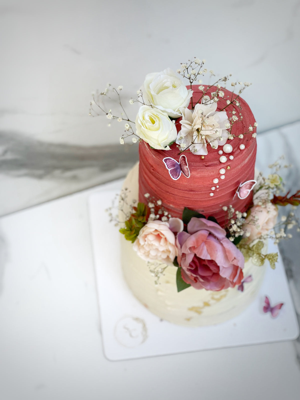 Whisper in pink cake from Saaaaiscakes Karachi